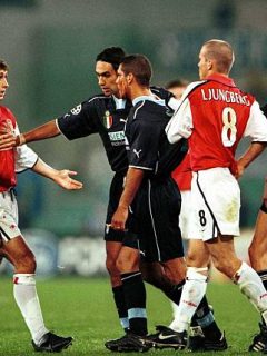 17 Oct 2000:   Captian Alessandro Nesta of Lazio seperates Diego Simeone of Lazio with a cut on his face and Gilles Grimandi of Arsenal during the match between Lazio and Arsenal in the UEFA Champions League Group B at the Olympic Stadium, Rome, Italy. Mandatory Credit: Clive Brunskill/ALLSPORT